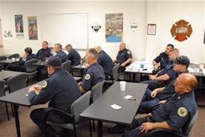 Fire officers in classroom